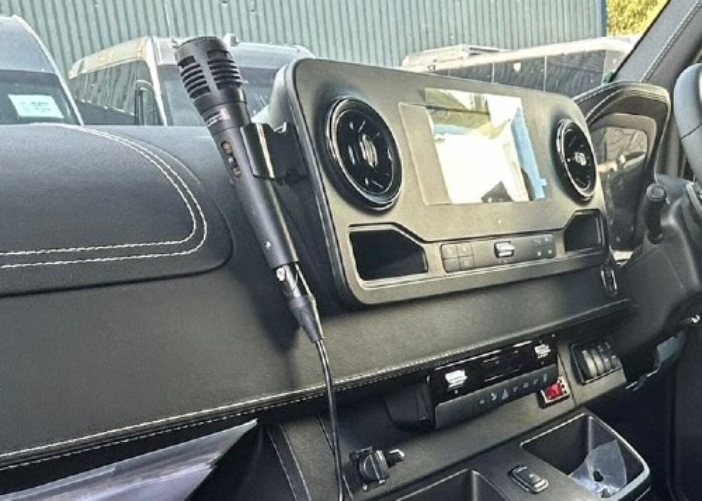 PA system microphone in 8 seat minibus